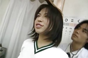 A young showgirl fucks with two illuminators in pussy and ass
